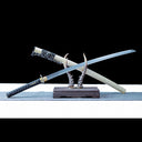 Sylvan Drake katana displayed above its natural wood saya