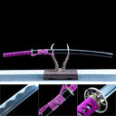 Amethyst Fang Damascus katana displayed with black saya and purple mounting details