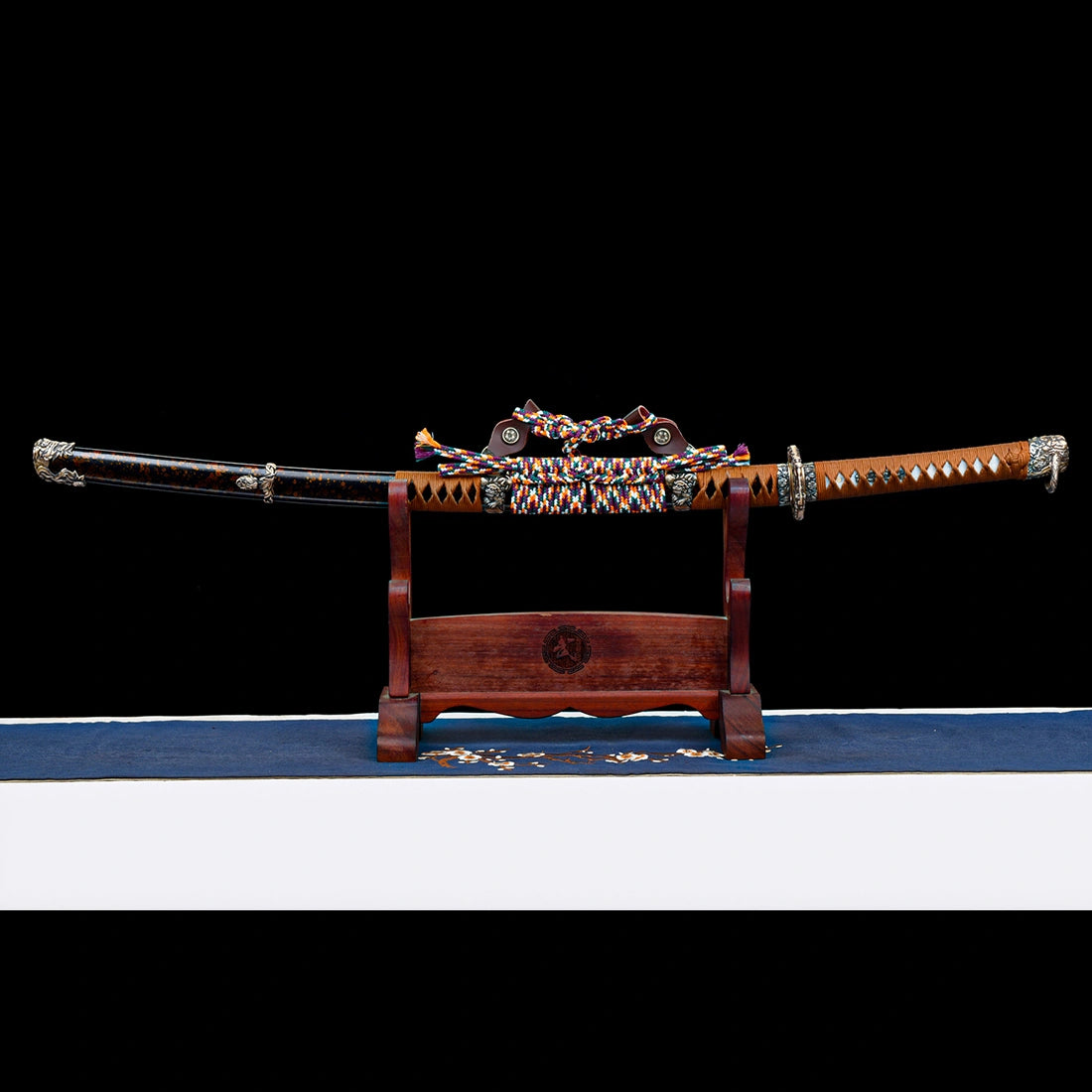 Dragonheir clay-tempered Damascus steel Tachi sword sheathed on wooden display stand with gold-flecked lacquer Saya