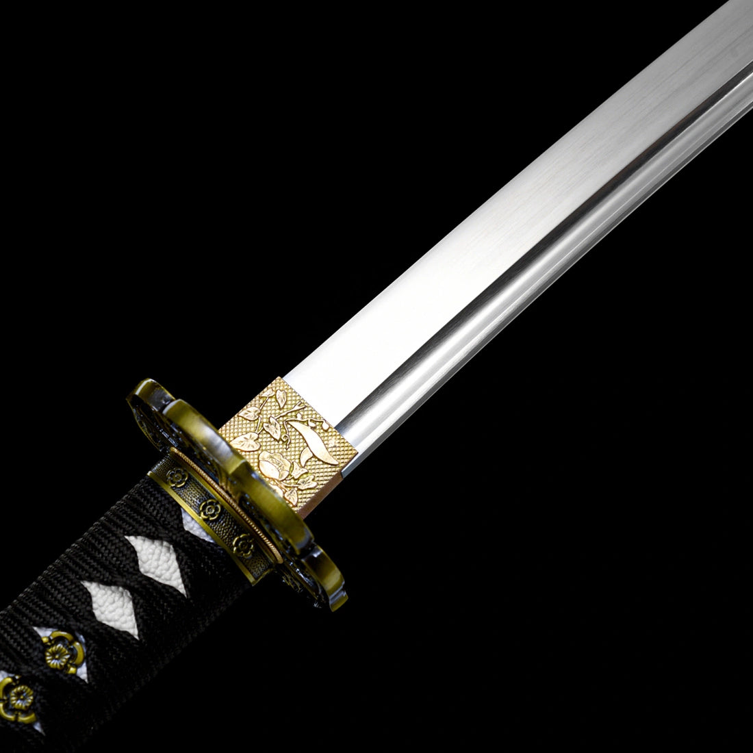 Intricate floral brass habaki collar and black wrapped tsuka handle with sakura alloy fittings
