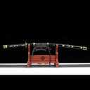 Sheathed Murasame tachi sword with lacquered black pear wood scabbard on wooden display stand