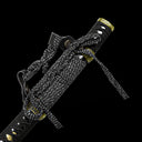Exclusive thick black and white sageo cord knot tied to traditional tachi leather hangers