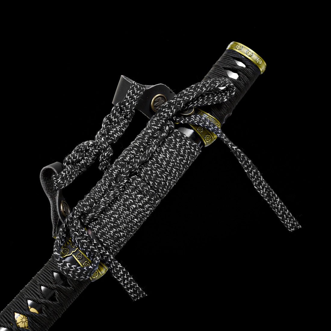 Exclusive thick black and white sageo cord knot tied to traditional tachi leather hangers