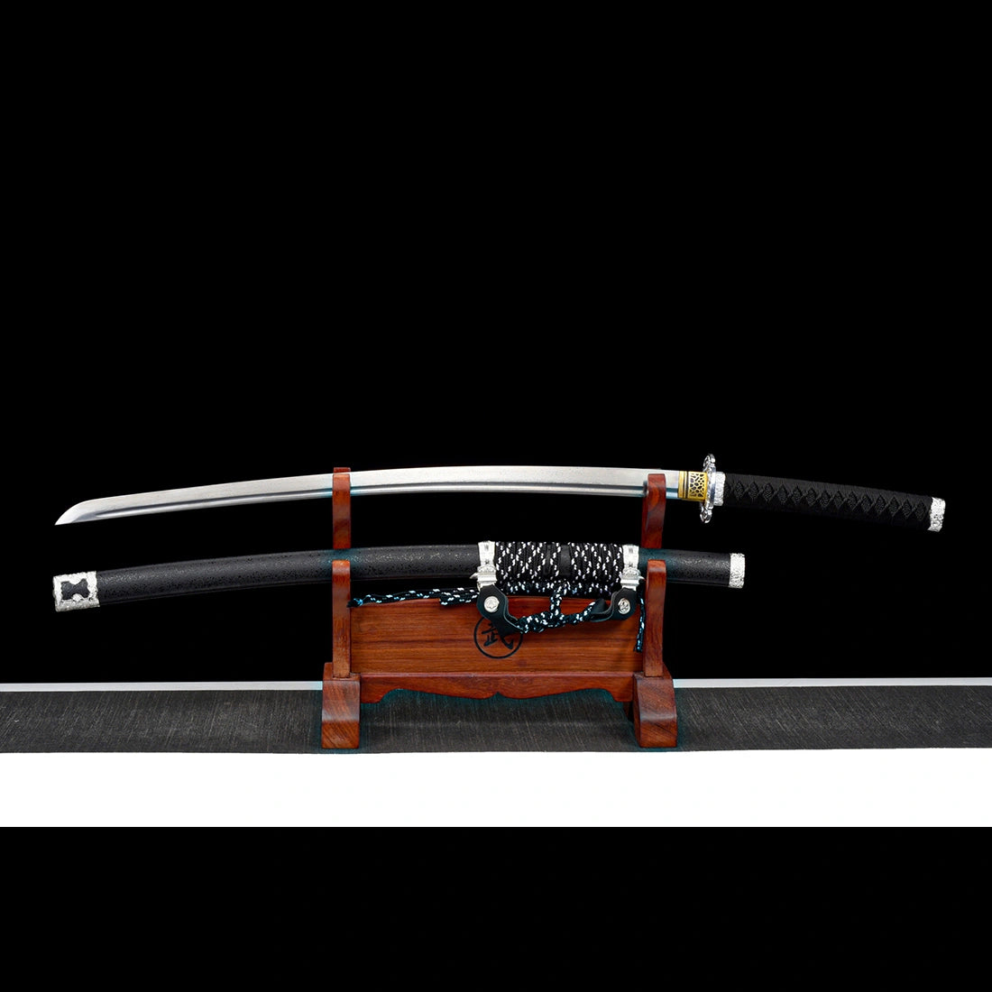 Oblivion Fang folded Damascus pattern steel tachi blade with precision-machined acoustic bo-hi blood groove