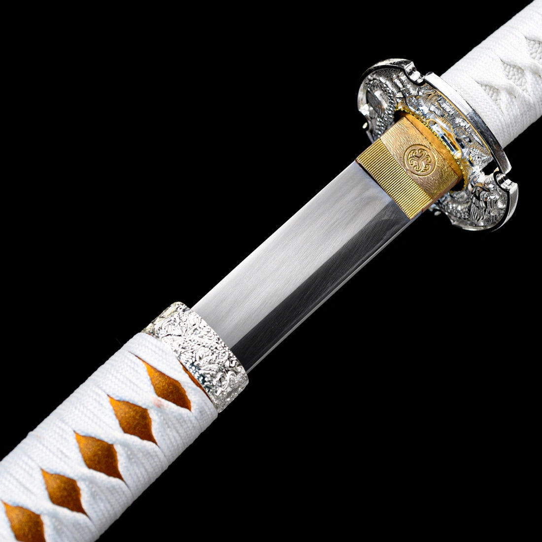 Brushed spring steel blade base with engraved brass habaki collar on tachi sword