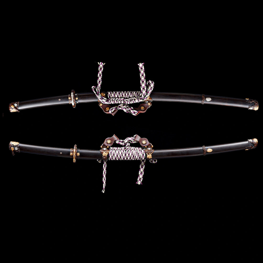 Side profile view of Tyrantclaw Tachi sheathed in smooth Brazilian ebony Saya with leather Ashi suspension hangers