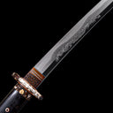 Detailed hand-engraved Dragon Horimono on clay-tempered Wootz steel blade with patterned copper Habaki collar