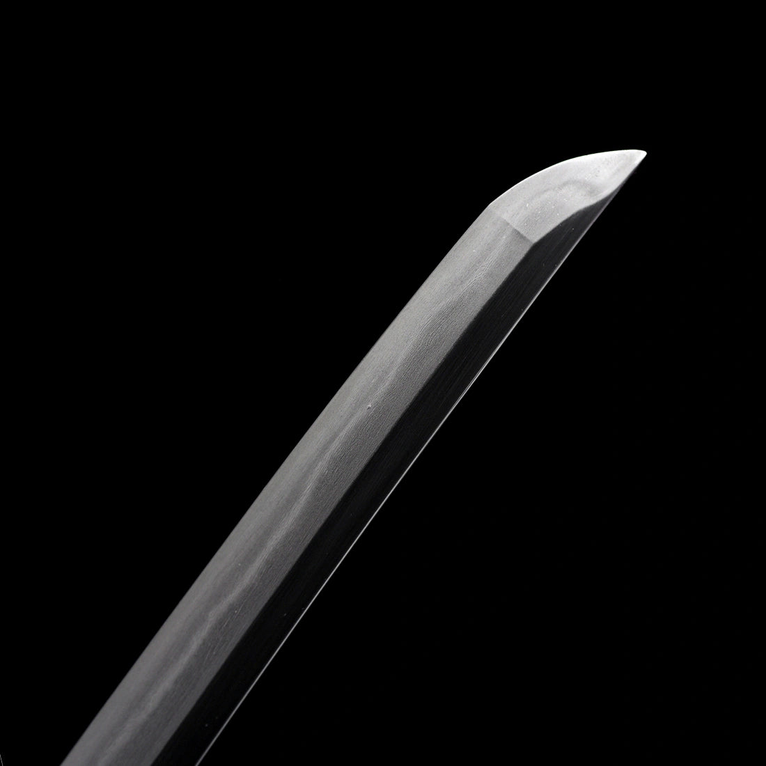 Hand-ground Kissaki tip with distinct traditional Yokote line on clay-tempered Wootz steel Tyrantclaw Tachi blade